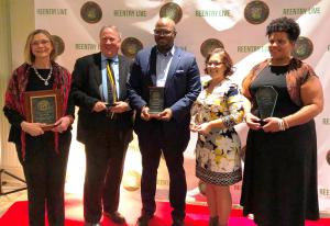 Criminal justice advocates and officials awarded for working to improve results for citizens returning from incarceration. (Left to right) Myra Woods, Reunion DC; John Stanard, Director of Social Betterment Programs & Policy for the Church of Scientology