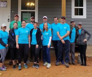 EBS employees give back to their community as they volunteer for Habitat for Humanity to help local families achieve homeownership.
