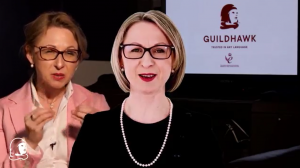 Screenshot from a multilingual video showing Jurga Zilinskiene MBE, the software coding entrepreneur and CEO of Guildhawk speaking in a film studio and her digital avatar speaking in the foreground