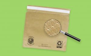 An image of a curbside recyclable Curby Mailer™ and a view of its internal honeycomb-structured paper cushioning.