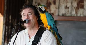 Higher resolution of John with parrot