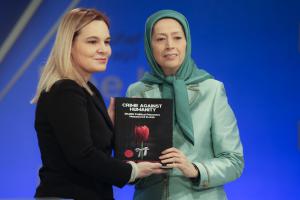 Ashraf-3, Albania, January 29, 2020 - Mrs. Monika Kryemadhi, Chairwoman of the Socialist Movement for Integration Party, and Mrs. Maryam Rajavi, the NCRI President-elect, holding the recently published book by the Iranian Resistance, entitled, “Crime Against Humanity”