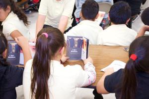 Students reading the popular “What are Human Rights” booklet. Free copies of this booklet can be mailed anywhere in the world by going to www.youthforhumanrights.org