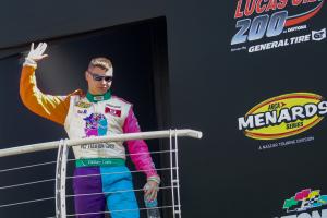 Racing sensation Zachary Tinkle waving to the crowd during the Lucas Oil 200 at Daytona International Speedway.