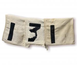 Three race-worn saddle cloths, part of an archive of items from Sir Barton – horse racing’s first Triple Crown winner – to be sold May 5th..