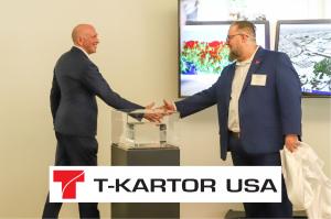 Simon Bailey, CEO T-Kartor USA Presents Steve Stone, Globe Building Managing Partner with Precision Partner Award