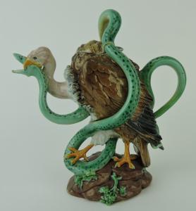 Minton majolica teapot in the form of a vulture attacking a snake, the vulture with a pink neck, brown feathers  (est. $30,000-$40,000).