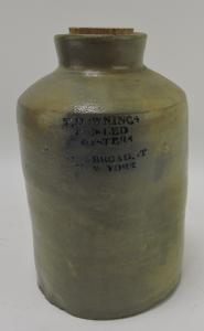 Extremely rare Thomas Downing (N.Y., 1791-1866) cylindrical oyster jar, 8 inches tall (est. $3,000-$5,000).