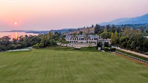 Atop a private 20-acre oceanview bluff, this Mediterranean-style mansion, featured in a Britney Spears music video, boasts 43,000± square feet of luxury living.