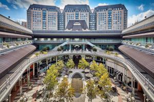 The Crescent Towers appear with The Crescent Retail Courtyard in the foreground.