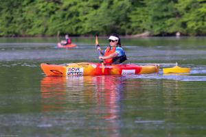 Female kayaking in the water
