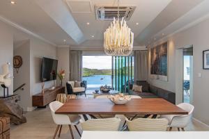 A sleek kitchen anchors an open-plan main living area with designer finishes and state-of-the-art appliances.