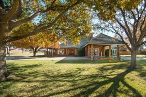A custom built 3,873± sq. ft. 3 bedroom 2.5 bath brick home on 2± acres. The home’s highlights include a 273± sq. ft. basement, a 3 car garage and a 834± barn/office