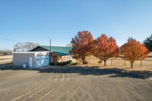 A custom built 3,873± sq. ft. 3 bedroom 2.5 bath brick home on 2± acres. The home’s highlights include a 273± sq. ft. basement, a 3 car garage and a 834± barn/office
