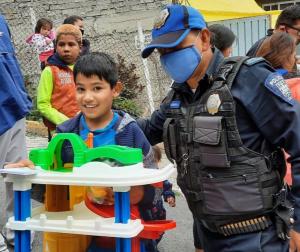 Mexico City’s Cuautepec de Madero is a hotbed of high-impact crime A unit of auxiliary civil defense police team up with The Way to Happiness Foundation to help children in Mexico’s most crime-ridden slum with a gift they hope will change their lives.
