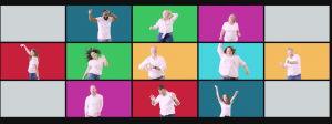 Clarus & Co. team dancing in front of multi-colored squares.