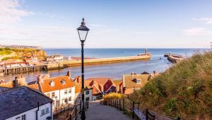 Whitby Bay in North Yorkshire, seen from the top of the steps up to Whitby Abbey