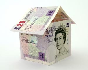 Twenty Pound Notes folded to make a house
