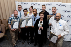 The Maryland team of Heritage Printing, Signs & Displays celebrates winning their PGAMA Print Awards.