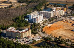 Creek Indian Enterprises Development Authority (CIEDA), the Poarch Band of Creek Indians' economic development arm, is pleased to announce the opening of Flamingo Crossings in Orlando, Florida Overhead construction view of hotel development progress