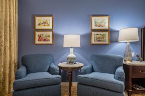 Club Chair Seating with Watercolor Art