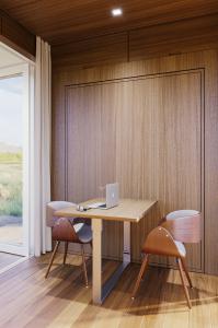 The Buhaus office is a customizable work space with a fold down desk.
