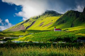 The national church of Iceland is organized into 266 congregations around the country, the photo shows Vikurkirkja, the local church in Vik, the southernmost village in Iceland (photo by Rudolf Kirchner from Pexels).