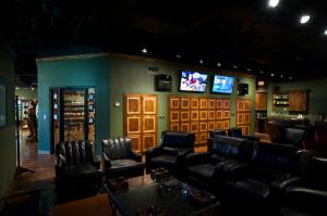 This is a look inside the back area cigar lounge at The Smoke Ring in Webster.