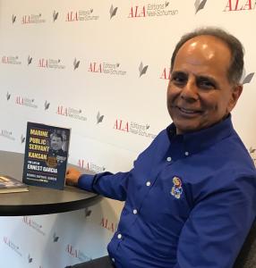 Dennis Raphael Garcia, AWA at ALA Event with Book