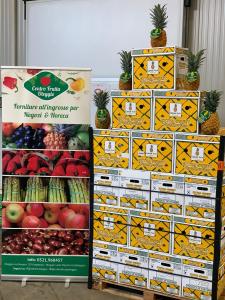 Photo of Colorada Fresh pineapples on display at fruit market in Italy