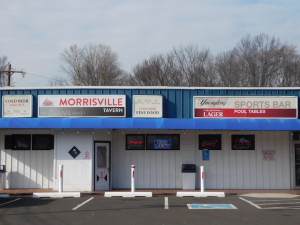 Before photo of the Morrisville Tavern signs