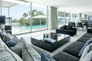 Decorated by renowned interior designer Bruno Erpicum, the villa is designed to capture the vibrancy and natural beauty of Ibiza.