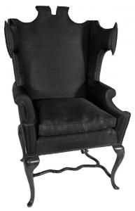 Mid-century wingback chair by Arturo Pani (Mexican, 1915-1981), upholstered in horsehair fabric with a split crest rail and extreme scroll wings ($9,225).