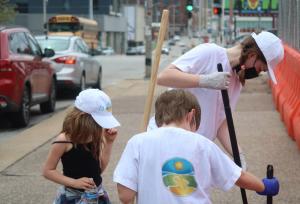 Youth apply precept #12 of "The Way to Happiness," “Safeguard and Improve Your Environment” by participating in a Crossroads Arts District cleanup organized by the Church of Scientology KC.