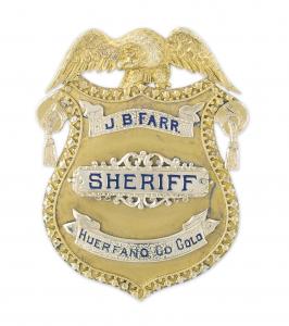 J.B. Farr’s early 1900s 14kt gold presentation sheriff’s badge, highly detailed, an important piece of Colorado history. Estimate: $8,000-$12,000.
