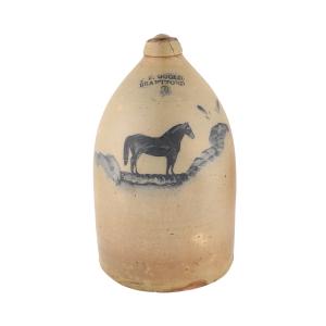Rare 1870s three-gallon jug by F. P. Goold, featuring a race horse decoration in cobalt slip (CA$20,060).