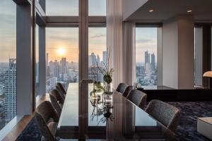 Take the high-speed elevator to the 40th floor and step into your spacious foyer with expertly appointed kitchen beyond.