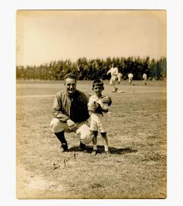 Circa 1933 photo of Lou Gehrig, shown posing with a young boy identified on verso as William Grice Bogg, signed by Gehrig (est. $3,000-$4,000).