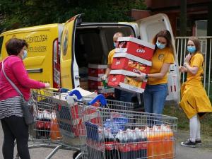 In preparation for the event, the Scientologists loaded their bright yellow Volunteer Ministers van with chips, baked goods and soft drinks.