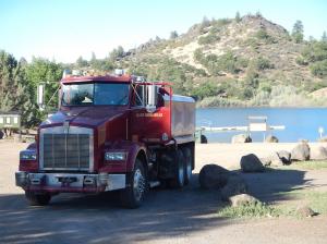 A CAL-FIRE water tanker drafting water from Iron Gate Lake to fight wildfire
