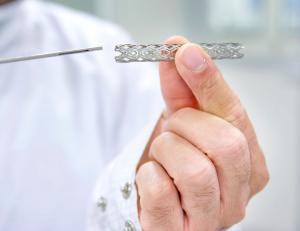 Physician holding Peripheral Vascular Stent