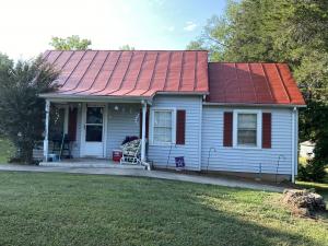 Solid 2 BR/1 BA home on .5 +/- acre lot -- 12'x20' workshop w/air compressor & separate electric meter -- Close to downtown Orange & less than 1.5 miles from all schools