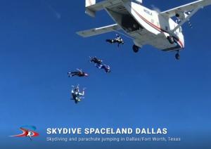 Skydivers exiting aircraft at Skydive Spaceland