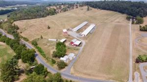 47.9 +/- acre farm -- 2 operational poultry houses -- $100,000+ in solar panels that power the farm -- New 80KW generator -- 4 BR/1 BA home -- Multiple outbuildings, barn, hay storage, litter shed, generator shed & 2 car detached garage -- Fencing