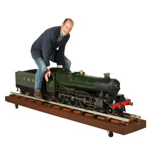 Finely engineered 7 ¼ inch gauge model of the Great Western Railway 4-6-0 locomotive and tender No. 1011 ("County of Chester") (CA$15,340).