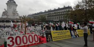 (Video) Iranians Across the World Protest Raisi’s Speech at UN Call For Accountability for 1988 Massacre 6 September 22, 2021 - Besides their protests, Iranians in the US, Canada, and Europe held photo exhibitions commemorating the 1988 massacre’s martyrs.