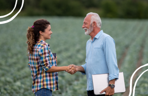 farmer and advisor shaking hands