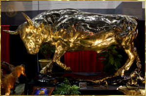 Lorenzo's Bull by Lorenzo Ghiglieri is a 10 foot sculpture cast in bronze and mirror finished on display at the Palm Beach Barrett Jackson Event in 2022