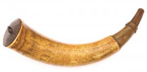 Rev War powder horn from 1775, carved near the base “The Royal Artillery” and owned by minute man Thomas Smith (estimate: $10,000-$15,000.)