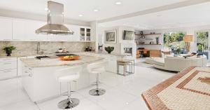 Huge kitchen with granite surfaces and designer appliances